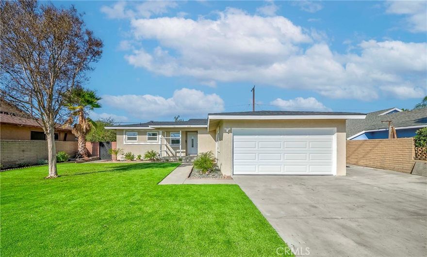 Welcome to this beautifully remodeled 3-bedroom, 2-bath single-family home nestled in the heart of Northeast Anaheim. Offering 1,278 sq. ft. of modern living space, this turnkey residence showcases a seamless blend of style, comfort, and functionality. Recent upgrades include a brand-new roof, HVAC system, plumbing, windows, and recessed lighting throughout. The remodeled kitchen and bathrooms feature contemporary finishes and fixtures, while new flooring brings warmth and harmony to every room. Enjoy a low-maintenance backyard with artificial turf, perfect for outdoor relaxation and year-round entertainment. Situated in a quiet, well-established neighborhood, this home provides convenient access to schools, shopping, dining, parks, and major freeways. Move right in and start living your best life in this beautifully upgraded Anaheim home that perfectly combines quality, convenience, and modern comfort.