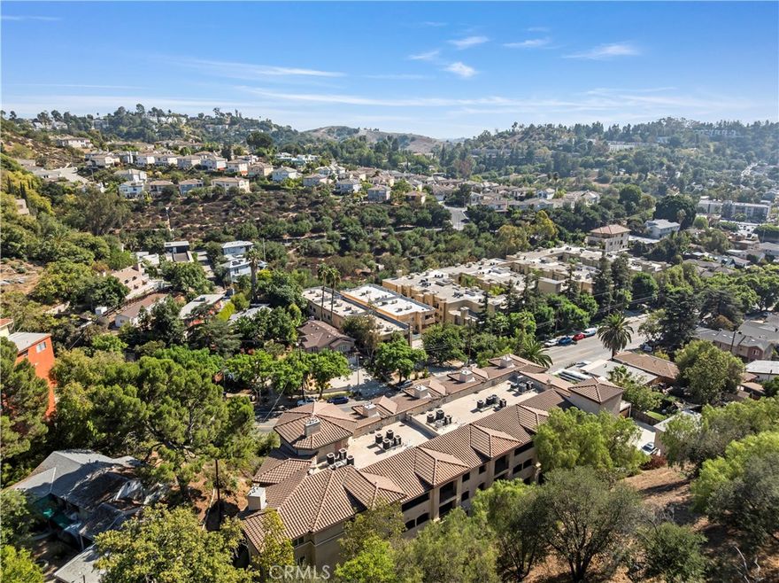 Welcome to the Monterey Villas Complex - On the market for your consideration is unit #205. This is unquestionably the best location within this building, granting the owners complete privacy from other units. The layout and location provide no adjoining neighbors on either side! The building elevation off the street provides peace and quiet, all while keeping you close to all the action South Pasadena has to offer. Live just minutes from Old Town Pasadena, a short drive to Downtown LA, and moments from some of the best locations in all of Southern California. Your privacy and convenience are also a top priority at the Monterey Villas Complex, offering gated and secure assigned covered private parking with guest parking within the structure as well. Secure keypad-only entry from the parking and into the complex. BONUS - this unit also has a separate private storage room!

As you enter the unit, observe the high ceilings, hardwood floors, recessed lighting, remote-controlled fireplaces, and the wide open living space, which brings your kitchen, dining, and living room areas together to enjoy as one.  If cooking and gathering are what you enjoy, this kitchen was made for you! The chef will surely appreciate the large pantry closet, stainless steel appliances, brand new dishwasher, and expansive granite countertops. This large kitchen includes a high-top counter, also ideal for entertaining or just enjoying a quaint meal at home. 

The main bedroom has large closets with plenty of storage space, lots of natural light, and a large en-suite bathroom complete with double vanities, granite counters, a separate shower, and a jetted soaking tub. PLAN YOUR VISIT TODAY - you will not be disappointed!