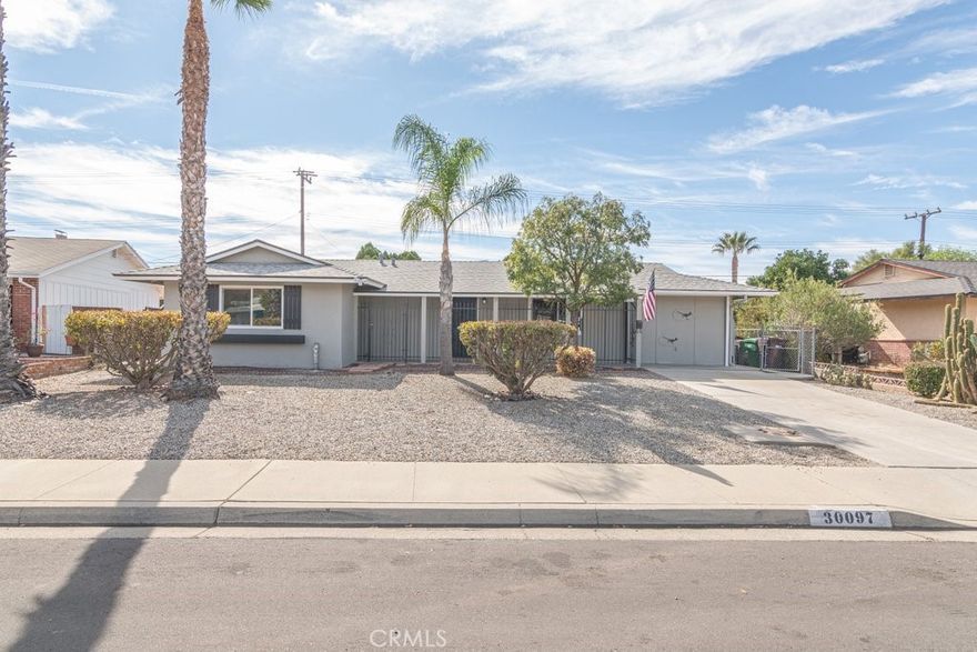 GORGEOUS NEWLY UPGRADED 55+ COMMUNITY HOME in Sun City/Menifee! This home has 2 large bedrooms with step in closets, 2 baths (Primary bath has a step-in shower and full bath in the hallway), a single car garage, family/great room, patio room, laundry/storage room, storage shed and large patio with patio cover. The interior of the home has been newly upgraded with new interior paint, new flooring, ceiling fans, modern recessed LED lighting,  and new blinds throughout. The kitchen is all new with new cabinets, quartz countertops, new island with quartz waterfall siding, all new stainless steel appliances, custom exhaust hood, and under cabinet lighting. Both bathrooms have been remodeled with new fixtures and vanities. The back yard has a patio and patio cover and looks to the low maintenance yard with grapevines, and fruit trees. This home is close to shopping, restaurants and commuting via the 215 freeway. A MUST SEE!