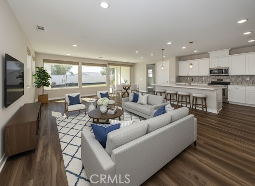 Adorable single-story home located in a highly desirable 55+ gated community! This 2-bedroom, 2-bathroom home offers an open floor plan with a versatile den that can also be used as an office. The kitchen is beautifully upgraded with quartz countertops, custom backsplash, pendant lighting, and stainless steel appliances—including refrigerator, washer, and dryer. Additional upgrades include recessed lighting throughout, upgraded flooring, and a spacious primary suite featuring a large custom-tiled shower.
Enjoy the fully landscaped backyard, perfect for relaxing or entertaining. The home also comes equipped with solar panels, making it energy efficient and cost-effective. Residents at Altis have access to the community clubhouse, which offers resort-style amenities such as a full gym, sparkling pools, an outdoor cooking area, and a calendar full of exciting community events.
Do not miss this incredible opportunity to own a beautifully upgraded home in a vibrant 55+ community!