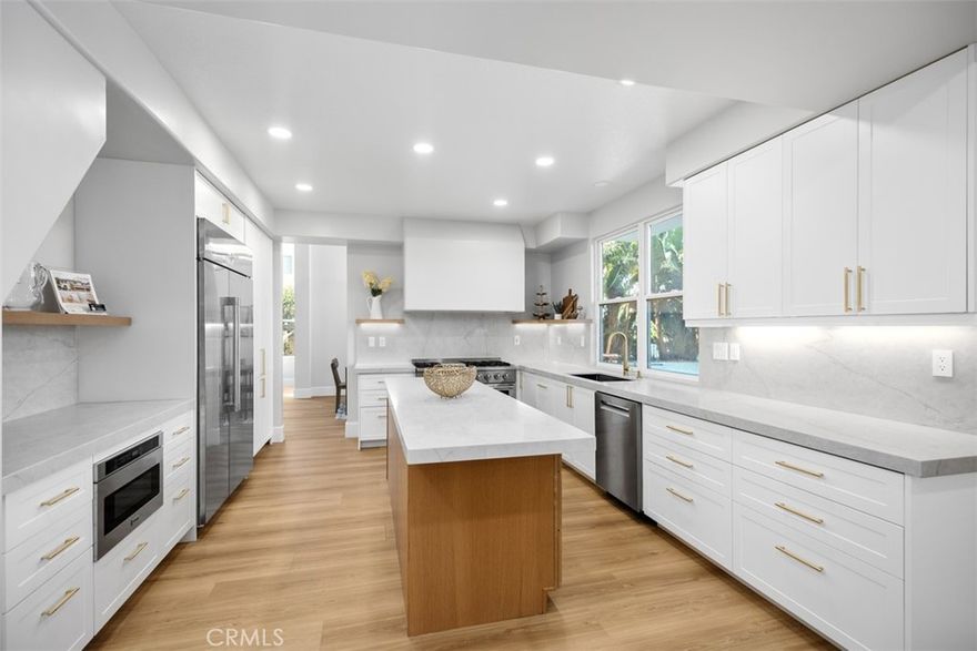 Welcome to 33 Bell Canyon, a stunningly remodeled home in beautiful Dove Canyon. This exquisite residence features interior design finishes, including new quartz countertops and high-end appliances that will delight any culinary enthusiast. 

Enjoy the ultimate entertainment experience with surround sound system, perfect for hosting gatherings. The outdoor space is equally impressive, complete with a new linx barbecue island, and new spa equipment, all enhanced by epoxy coating and stylish tile.
Additional features include soaring ceilings, downstairs en suite, two new awnings for added comfort and shade, a new HVAC system, new recessed lighting and fresh paint throughout the home. The new plank flooring adds a modern touch, seamlessly blending style and functionality. No detail was overlooked in this renovation.

Step outside to experience breathtaking golf course views, making this home a true sanctuary. Located in a prestigious guard-gated community, 33 Bell Canyon offers both luxury and security, making it the perfect place to call home. Don't miss the opportunity to make this dream residence yours!