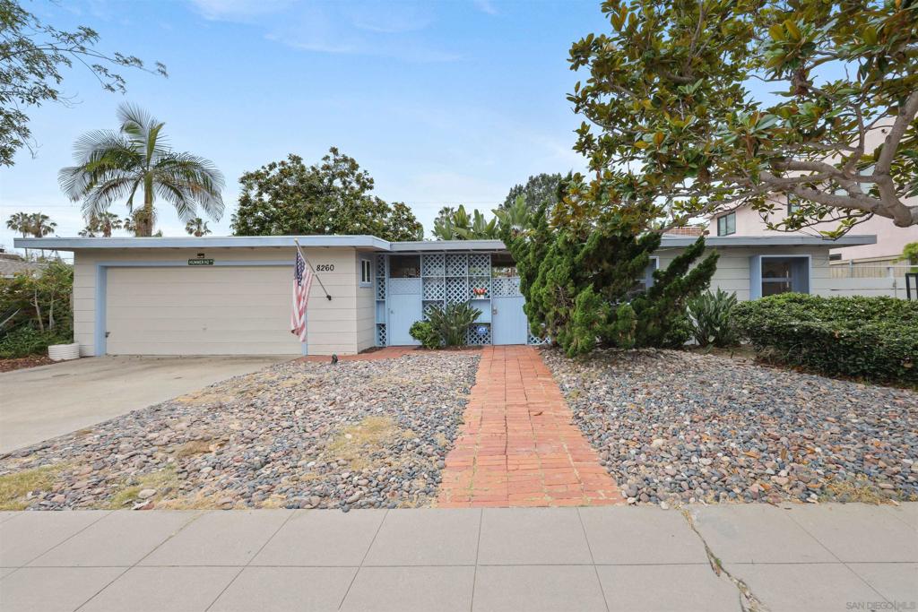 Exceptional opportunity in the heart of La Jolla Shores! Situated on a generous 7,871 sq. ft. lot, this rare 1,765 sq. ft. property features a 3-bedroom, 2-bath main residence plus a detached 1-bedroom, 1-bath casita—perfect for guests or a private home office. The flexible layout is centered around a spacious, enclosed courtyard that offers privacy and effortless indoor-outdoor living. With its large lot and versatile footprint, the property offers incredible development potential. Customize or expand the current layout, build your dream beach compound, or maintain as a charming, income-producing retreat in one of San Diego’s most desirable coastal neighborhoods. Just blocks from the beach, La Jolla Beach & Tennis Club, and the shops and restaurants of La Jolla Shores Village, this is a rare chance to own a property with character, flexibility, and upside in an unbeatable location.