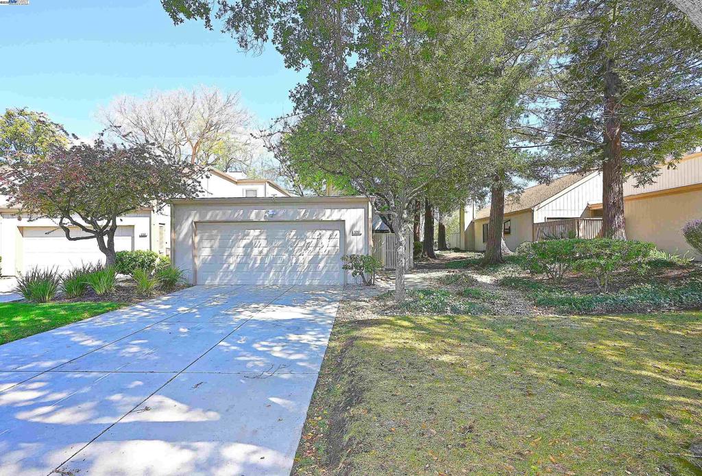 Located in the heart of Pleasanton, this stunning 2-bed, 1-bath townhouse is just minutes from Stoneridge Mall, BART, and major freeways. The home features an open layout with an accent wall in the family room, gorgeous tile fireplace, and a private patio with new concrete and accent artificial turf with large patio doors that makes indoor-outdoor living an entertainer’s dream. The kitchen shines with new stainless-steel appliances, Scandinavian dual toned cabinets that extend into the nook, and custom tile. Both bedrooms feature accent walls, and the Jack-and-Jill bathroom has been beautifully renovated with designer tile full surrounds, Scandinavian oak cabinets, plumbing fixtures, and dual vanity for the primary suite. New waterproof laminate flooring, fresh paint, and updated fixtures add to the home’s charm. Enjoy HOA amenities like a pool, tennis/pickleball courts, and a clubhouse. It’s the perfect place to call home!
