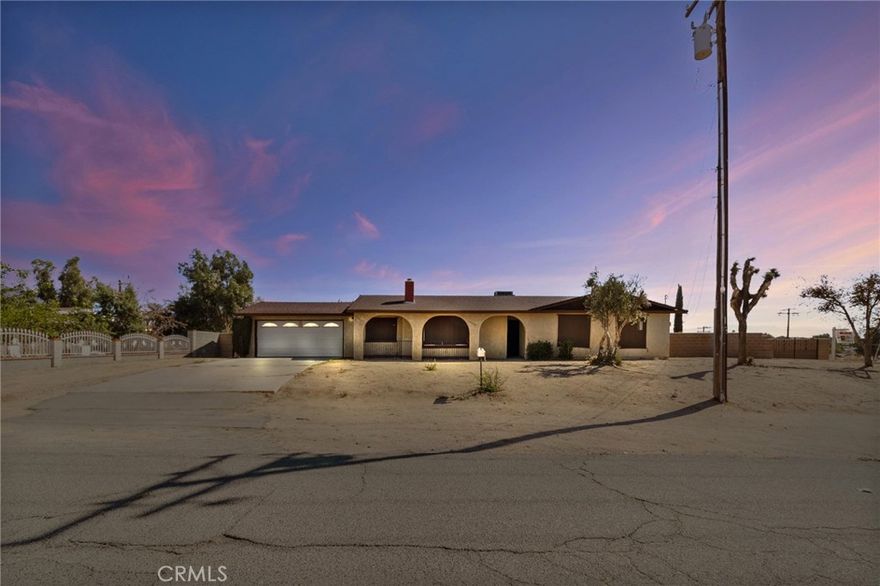 Welcome to this beautifully updated 3-bedroom, 2-bathroom home, perfectly situated on an expansive lot with endless possibilities. A brick wall divides the backyard into two distinct areas, offering versatility for future use. The property is already connected to the public sewer system, and a double iron gate provides access to the backyard—spacious enough for RV parking.



Inside, you'll find a completely remodeled kitchen featuring brand-new cabinetry, elegant quartz countertops, and stainless steel appliances—including a gas stove, sink, dishwasher, and microwave. Both bathrooms have been tastefully renovated to match the kitchen's modern finishes, creating a cohesive, stylish feel throughout.



Enjoy comfort year-round with central air and ceiling fans in every room and a cozy gas fireplace in the generous family room—ideal for cool winter evenings. Durable tile flooring has been installed in high-traffic areas, while new vinyl plank flooring adds a sleek touch throughout the rest of the home.



The attached 2-car garage offers direct access into the home, making grocery unloading a breeze. Out back, a long covered patio sets the scene for outdoor entertaining, ideal for relaxing or hosting friends—true California living at its best.



With RV access and room to add an ADU, build a pool, install a jacuzzi, or create additional parking, the potential here is endless.



Conveniently located near shopping centers, gas stations, and major roads with quick access to the 15 Freeway.



This move-in-ready home is waiting for its next owner to enjoy all it has to offer—don't miss this opportunity!