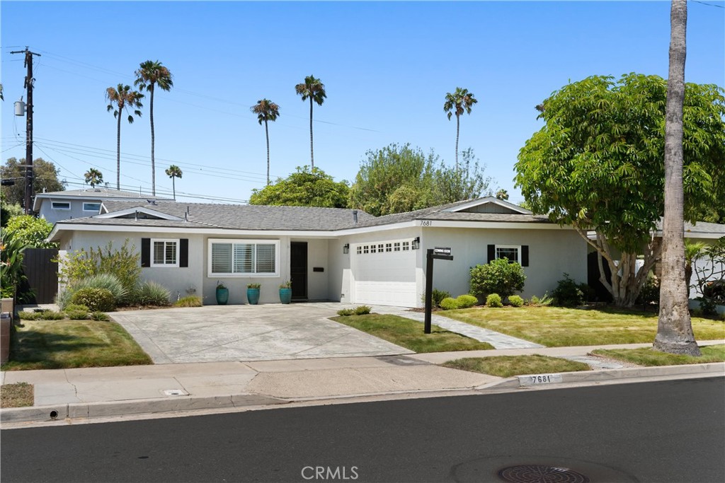 Welcome to 7681 Quebec Drive, your perfectly updated single level home in Huntington Beach! Quick Highlights of the home include: Beautifully updated kitchen, updated bathrooms, real wood flooring, new paint, new carpet, dual pane windows, dual EV charging hookups, 200 amp electrical panel, AC, screened in covered patio, great entertaining and outdoor spaces, interior laundry room, attached 2 car garage with epoxy floor, and a prime location in the heart of a family neighborhood, walking to Terry Park, 5 Points Plaza, and so much more! Step inside to discover a beautifully remodeled kitchen featuring crisp shaker-style cabinetry, quartz countertops, and top-tier finishes—ideal for families that love to cook! The home boasts real hardwood floors throughout the main living space, plush new carpet in 2 of the bedrooms, and dual-pane windows throughout. Both bathrooms have been tastefully modernized, balancing clean design with timeless appeal. Additional upgrades include central air conditioning, a 200-amp upgraded electrical panel, and a convenient interior laundry room. Enjoy the attached two-car garage, complete with a durable epoxy-finished floor, and ample driveway parking—accommodating multiple vehicles, with RV & and boat storage potential. Additionally, the garage features two installed 50 amp outlets, ready for EV chargers. Outside, the home seamlessly extends outdoors via a screened, covered patio—a perfect extension of the living area and ideal for hosting year-round. The entire yard has been enhanced with upgraded hardscape and lush landscaping, creating a private setting. Nestled in the desirable Huntington Riveria neighborhood, the property is walking distance to multiple parks, and 5 Points Plaza, featuring a vibrant mix of shopping, dining, and essentials like Trader Joe’s. Just a quick bike ride takes you to Main Street, Downtown Huntington Beach, Pacific City, and Huntington State & City Beaches—perfect for sunset strolls or surfing sessions. The area also boasts top tier schools, for families with kids. 7681 Quebec Drive is the epitome of Huntington Beach living, and at this list price, the home won't last! Your Perfect L3: Location, Luxury, Lifestyle.