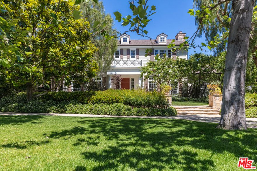 A rare opportunity to own a pristine traditional home designed with taste, style and quality on one of the most sought after streets on the Westside.  From the moment you enter, the floor plan with its indoor/outdoor flow lures you to private park-like gardens/patios, grassy yards, spa and inviting indoor/outdoor living room w/T.V.  A very open eat-in cook's kitchen/family room, formal dining, step down living room, library/study, office, maids and bath complete the first floor.  A sweeping staircase leads to an additional four bedrooms and four baths up, including a large master, and a private terrace overlooking your own private park!  A rare opportunity to purchase a custom home on 16,000 sq ft lot, located in close proximity to the Brentwood Country Mart, Montana Avenue and Brentwood Country Club.