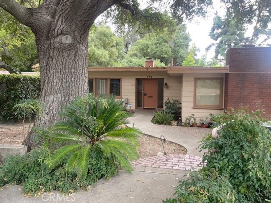 Village Mid-Century Modern. Large windows that bring in indoor and outdoor spaces. Entry that leads to large living room with stone fireplace. French doors lead to patio and pool area. Master bedroom with window to pool and hallway bath with double sinks. Two additional bedrooms and bath. Large closets, lots of storage. Functional kitchen that opens to a family room with another fireplace. Separate laundry room off garage. Park like setting with large Oak tree in front yard. Two car garage. Large Corner lot. This property has been lovingly cared for by same owners for over 50+ years.