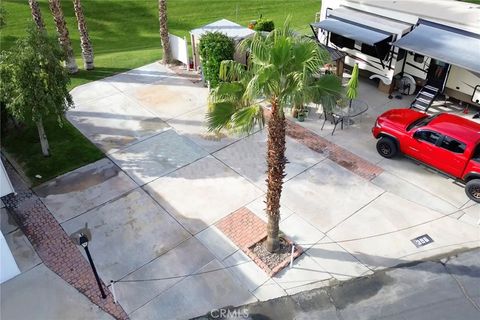 Photo of 69801 Ramon Rd, Cathedral City, CA 92234 (MLS # OC26057582)