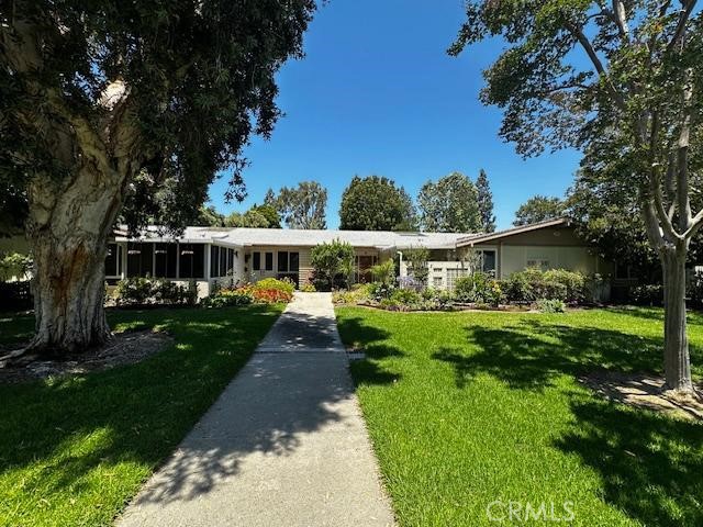 Enjoy this charming remodeled Granada located near Serpentine Walk. It is light and bright and enjoys a southeastern exposure. Eminities feature central heat and air, smooth ceilings, newer windows, and a stackable washer/dryer. This gem features ceiling fans installed in the dining room and master bedroom. With two wonderful outdoor areas, one a tiled atrium and a cozy front patio, covered for you to enjoy the beautiful California weather. This is a premier 55 + senior community located very near Laguna Beach and offers many great amenities. A 27-hole executive course awaits you with a 9-hole executive walking course, tennis courts, bocceball courts, several excellent fitness centers, seven clubhouses, five pools, and Clubhouse 4, which offers everything from oil and water color painting to ceramics and jewelry making. The wood shop awaits you, and also the sewing room. There are over two hundred clubs with an interest in charming everyone, and an 850-seat theatre with many highly gifted performers and community Theatre Guild performances. Come and live in this exceptional senior community and stay healthy and happy.