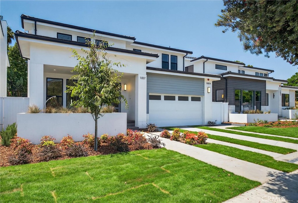 Lovely, “Warm-Modern” Design, this newly constructed home was caringly designed with family and friends in mind. Located in a highly sought-after area of South Redondo Beach, just 1.5 miles to Riviera Village and the Redondo Beach coast. This exceptional home with it’s spacious 3,326 sq. ft. in the main house, features a desirable floorplan with 1 ground level bedroom and private bath, plus 3 more bedrooms and 2 bathrooms upstairs. Additionally, enjoy a completely separate, 550 sq. ft. 1 bed/ 1 bath ADU with kitchen and laundry; perfect for live-in help or extended family needs, making a total of 3,875 sq. ft. The main house features premium Italian cabinetry by AR-Due, Thermador appliances with dual fuel range, quartz counter tops, European Oak hardwood flooring and custom closet systems by Maronese ACF, known for their craftsmanship and design. Enjoy the benefits of new construction, including battery ready Solar systems and tankless water heaters on both the main house and the ADU, all separately metered. Quality craftsmanship from top to bottom, this home is a treasure to be discovered by a very lucky family. This one checks all of the boxes!