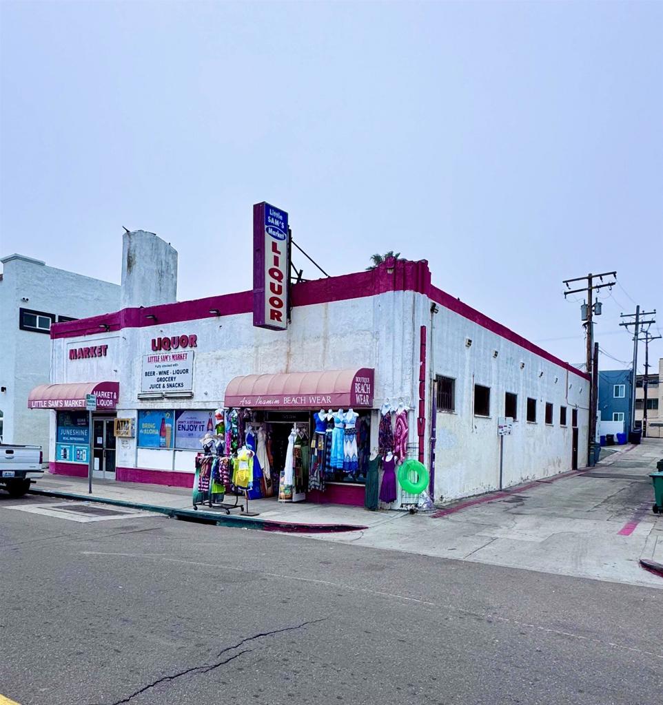 5 buildable lots, making up of a Commercial building approx 3950 soft on 3 lots, plus 2 additional lots. 1st time on the market in decades, Beach close less the 200 feet to the sand. Build 5 single family homes and enjoy the beach.