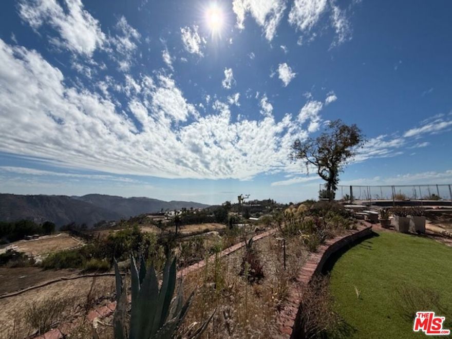 280 degree Ocean View Property, Prime Malibu Location! Located on the south end of Malibu, just 10 minutes from PCH and convenient to Santa Monica and Calabasas.  This property offers a wonderful opportunity in a desirable location.  Perched above Malibu Beach and Duke's, the site features sweeping ocean views and is a Palisades fire rebuild. The prior residence consisted of 4 bedrooms and 3 bathrooms totaling approximately 3,087 sq. ft. (per public records). Bring your developer and create your dream home overlooking the Pacific.    Buyer to verify all information, including but not limited to: the CA Governors Executive Order, existing septic system, on site power, permits for rebuild etc. Paved roads and surrounding neighborhood remain intact.