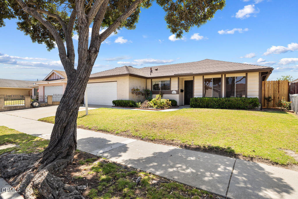 Nestled in a well-established neighborhood, this spacious home offers 4 bedrooms and 2 bathrooms with approximately 1,930 square feet of living space on a 5,662 sq ft lot.Step into the charming retro-style kitchen, featuring classic black-and-white checkered flooring that adds timeless character. The kitchen offers ample cabinetry with warm wood finishes, generous counter space for meal preparation, and a large window over the sink that fills the room with natural light and frames a pleasant view of the front yard. Additional features include a built-in oven, a ceiling fan with lighting, and plenty of room for storage and casual dining.The kitchen opens seamlessly to the family room with a welcoming brick fireplace, while a spacious bonus living area provides abundant natural light through large windows and sliding glass doors that lead to the backyard. This versatile space features neutral carpeting and textured ceilings, creating a warm, inviting atmosphere. The extended bonus area can be used as a family room, home office, or game area.The primary bedroom includes a walk-in closet and an en-suite bathroom.High functionality inside and out, all within close proximity to schools, parks, beaches, dining, and shopping.Offered at $765,000.