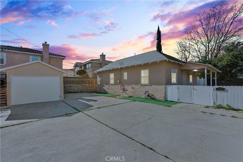 Photo of 1445 S Rebecca Street, Pomona, CA 91766 (MLS # TR26007811)
