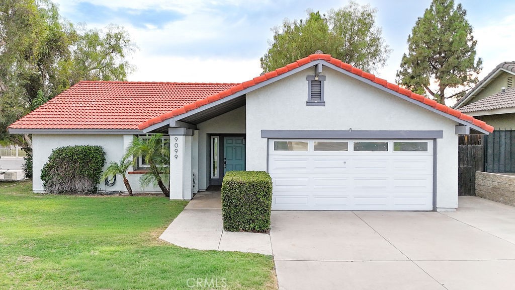 WELCOME HOME! This charming single-story three-bedroom, two-bath home is nestled in the desirable Orangecrest Community of Riverside. Sitting on a corner lot, the home boasts fresh exterior paint, new lighting, and excellent curb appeal. A beautiful park is located just behind the property, perfect for walking your dog, enjoying the exercise equipment, or playing with the kids. Inside, you’ll find updated laminate flooring throughout and abundant natural light. The kitchen has been refreshed with painted cabinets, new hardware, a stylish backsplash, farmhouse sink, and quartz countertops. Additional upgrades include a remodeled bathroom, new blinds, a newer HVAC system with an EcoBee thermostat, and a recently replaced water heater. The open-concept family and dining area features a cozy fireplace, creating the perfect gathering space. If you love to garden, the serene backyard includes fruit trees such as avocado, mandarin, lemon, and thyme to complement your favorite recipes. Conveniently located within walking distance to schools, grocery stores, shopping, and restaurants, this home truly has it all. Don’t miss your chance to see it! Schedule a showing today!