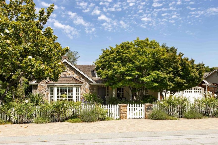 Experience the pinnacle of sophisticated living in this expansive home situated on over a third of an acre in the desirable South of El Monte neighborhood. A charming white picket fence surrounds a flourishing garden entrance, leading to an interior where rich hardwood floors, dazzling light fixtures, crisp white millwork, and abundant natural light create an atmosphere of luxurious livability across nearly 3,800 sf. Enjoy elegant formal rooms, cozy fireplaces, a convenient office, gourmet kitchen, and primary suite. An entertainer's dream awaits in the backyard, where you will find an inviting courtyard, an outdoor kitchen, and a bocce ball court, all set against the backdrop of this incredible property's beauty and tranquility. Ideally located just minutes from both downtown Los Altos and the Rancho Shopping Center, this home is also close to parks and commute options, and enjoys access to Covington Elementary, Blach Intermediate, and Los Altos High (buyer to verify eligibility).