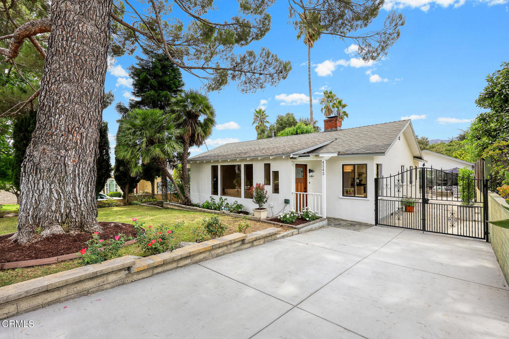 A rare find in La Canada Flintridge, 4543 Rockland Place features a charming 3-BR / 2-BA main residence, a 1-BD/ 1-BA GUEST HOUSE and a multi-use bonus room all on one property. The newly remodeled main residence offers 3 BR/ 1.5 BA across 1,345 sq ft of comfortable living space. Natural light fills the home, creating a bright and welcoming atmosphere. All three bedrooms and the full bathroom are tucked away down the hall, while the open family room and dining area create a warm setting for both everyday living and entertaining. Recent updates includebrand newly remodeled bathrooms, copper plumbing, updated electrical, stainless steel appliances with granite counters, new kitchen flooring, new light fixtures throughout the home including a dining room chandelier, recessed lighting, designer ceiling fans with remotes, and fresh interior and exterior paint. Enjoy the original solid oak hardwood floors, a brick fireplace, sprinkler system in the front and back yard, and Central A/C for year-round comfort. A standout feature of the property is the 1-BR / 1-BA Guest House offering 702 sq ft with a newly remodeled kitchen and open living space. The guest house has been recently updated with new cabinets and counters, recessed lighting, and wall-unit air conditioning, making it ideal for extended family, visitors, or rental income. In addition, the 175 sq ft bonus room adds even more options, and would be perfect for a home office, gym, art studio, or additional storage. The outdoor spaces are equally inviting, offering room to relax, entertain, and enjoy the California lifestyle. A spacious patio provides the perfect setting for outdoor entertainment or al fresco dining, and the gated driveway adds privacy. Both the front and back yards provide plenty of grassy space, with a large pine tree offering shade in the front yard and a lemon tree in the back. A newer water heater and recent upgrades throughout the property provide both comfort and peace of mind. Conveniently located near schools, shopping, dining, and freeway access, this property presents a unique opportunity to enjoy multiple living spaces on one lot. This home delivers comfort, versatility, and long-term investment potential in the heart of La Canada Flintridge.