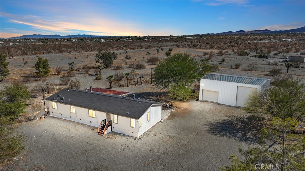2.9% FHA assumable mortgage !! This unique four-bedroom, two-bathroom home on a quiet dirt road offers country living at its finest! Sitting on just over*** 2.4 FULLY FENCED *** acres, you’ll have endless space for animals, RVs, and all your toys. Picture yourself winding down the day with a cool drink on the inviting front porch.
The property features a massive, permitted 30x40 metal garage/workshop with two roll-up doors and both 110v & 220v power—perfect for hobbies, storage, or RV parking.New electrical panel on house and new energy efficient toilets.
Inside, you’ll enjoy a wide-open living space that makes entertaining easy. The spacious master suite offers a generous walk-in closet, while the oversized laundry room includes a stacked washer and dryer.
Located just a short distance from Highway 138, this home is ideal for down-the-hill commuters. Don’t miss your chance to make it yours—schedule a showing today!