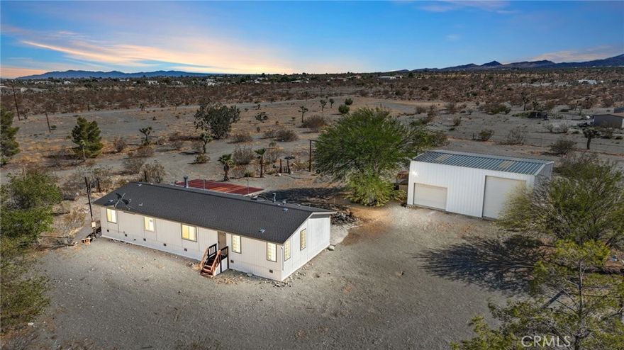 2.9% FHA assumable mortgage !!  This unique four-bedroom, two-bathroom home on a quiet dirt road offers country living at its finest! Sitting on just over*** 2.4 FULLY FENCED *** acres, you’ll have endless space for animals, RVs, and all your toys. Picture yourself winding down the day with a cool drink on the inviting front porch.



The property features a massive, permitted 30x40 metal garage/workshop with two roll-up doors and both 110v & 220v power—perfect for hobbies, storage, or RV parking.New electrical panel on house and new energy efficient toilets.



Inside, you’ll enjoy a wide-open living space that makes entertaining easy.  The spacious master suite offers a generous walk-in closet, while the oversized laundry room includes a stacked washer and dryer.



Located just a short distance from Highway 138, this home is ideal for down-the-hill commuters. Don’t miss your chance to make it yours—schedule a showing today!