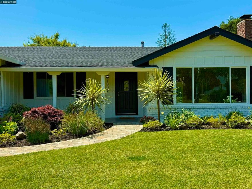 Nestled in one of Moraga’s most desirable neighborhoods, this remodeled single-level home blends comfort, charm, and convenience. Featuring 3 bedrooms and 2 bathrooms, including a primary suite with an en suite bath, this home is designed for easy living and effortless entertaining.  Step into a light-filled living space with hardwood floors throughout, recessed lighting in the living room and hallway, and a functional, flowing floor plan. The updated kitchen boasts sleek Corian countertops and offers a seamless connection to the dining and living areas.  Two of the bedrooms open directly to the enchanting backyard through glass sliders, where a manicured lawn, a majestic Japanese maple, and a vibrant row of roses frame serene views of the hills. Whether you're soaking up the sun or relaxing in the shade, this private outdoor space is pure magic.  Enjoy close proximity to Moraga’s favorite amenities—top-rated schools, a weekly farmers’ market, the country club, grocery stores, restaurants, and more—all just moments away.    With its charming curb appeal, inviting front lawn, and thoughtful updates throughout, 1032 Sanders Drive offers the ideal blend of indoor-outdoor California living.