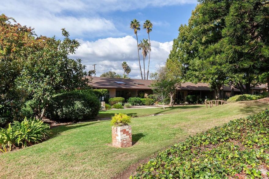 Prime La Mesa location..SO QUIET!! This 1-story immaculate villa style unit will go fast. Very few here at Grossmont Village every hit the market. Enjoy back patio BBQ's on a parklike setting on your front porch. Brand new windows and patio sliding doors, freshly painted, new ceiling fans and lighting, LVP flooring, custom bathroom with walk-in shower, fireplace and more. Covered parking directly behind unit and association allows permits for additional parking. HOA covers pools,water, trash, common area and insurance.