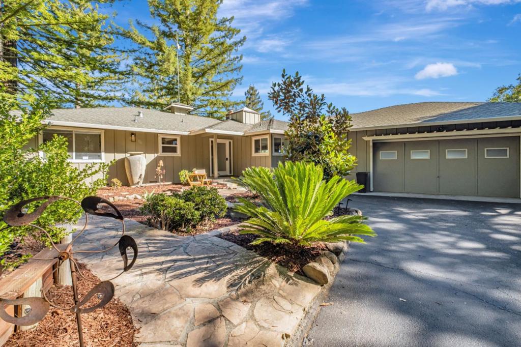 Discover unparalleled elegance in this Los Gatos home, 15 minutes from downtown LG. Enjoy easy access w/ a short 2-min drive up the hill on private road, conveniently located off Hwy 880 and Glenwood Drive. Truly a one-of-a-kind property w/ stunning views of mountains & Monterey Bay from generous wrap-around deck, Full sun exposure & privacy on 3.82 acres. Gourmet kitchen, Large island & extra-large pantry/laundry room, is a chef's dream. Floor to ceiling 4 panel FOLDING patio door opens to the upper deck, seamlessly blending indoor & outdoor spaces, great for BBQ & Entertainment. Large living room w/ brick fireplace & a picturesque window to enjoy the views. Large Bedrooms light, bright & spacious. Huge Primary suite, w/ his and her baths & closets. Attached, oversized 2 car garage. Large Driveway w/ RV parking (water & power) surrounded by majestic redwoods and a Large flat backyard, with fruit trees and potential for an ADU. Hurry, this one will not last. Easy return back to LG from Glenwood Cutoff 3 min. south on 880 NOTE -2 different addresses show up depending where u search. 24705 Spanish Oak Road, LG, Ca 95033 - OR - 24705 Santa Cruz Highway, LG, Ca 95033 - Also Dont Miss exit for Spanish Oaks Rd, off Hwy 880, it's a couple of minutes passed Glendwood Dr. Easy to miss