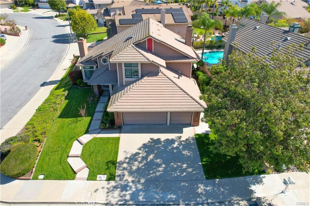 Great Location, Location. House located in quiet neighborhood corner lot. The house recently remodeled with new floor, paint, kitchen, bathroom, custom window. Walk in pantry, high ceiling fan. One Bebroom or can be office 3/4 bath downstairs. Great house for first time buyer. Beautiful front and back yard with covered patio. Close to schools/freeway/shopping center, ect...