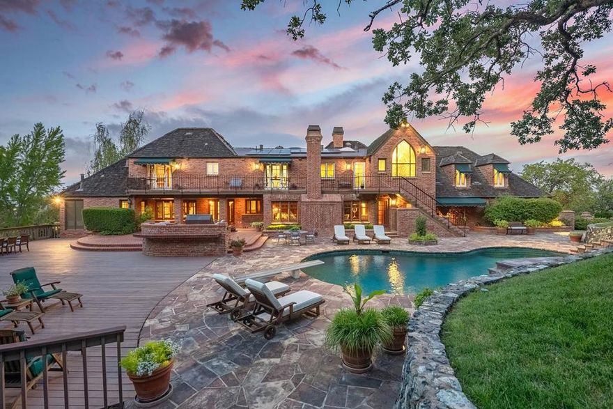 Set within Saratogas Parker Ranch neighborhood, this property is a distinguished English Country estate that is both formal and warmly inviting. Redesigned by Los Gatos artist and designer David Stonesifer, it exudes charm, character, and sense of home.Thoughtful architectural details of old world brick construction and custom millwork offer spaces for entertaining as well as quiet retreats.The grounds are equally inviting, with a koi pond, and mature oaks creating a peaceful backdrop that feels worlds away; yet just minutes from town, heart of Silicon Valley and international transportation. Elegant but approachable, this home welcomes you in and leaves a lasting impression.