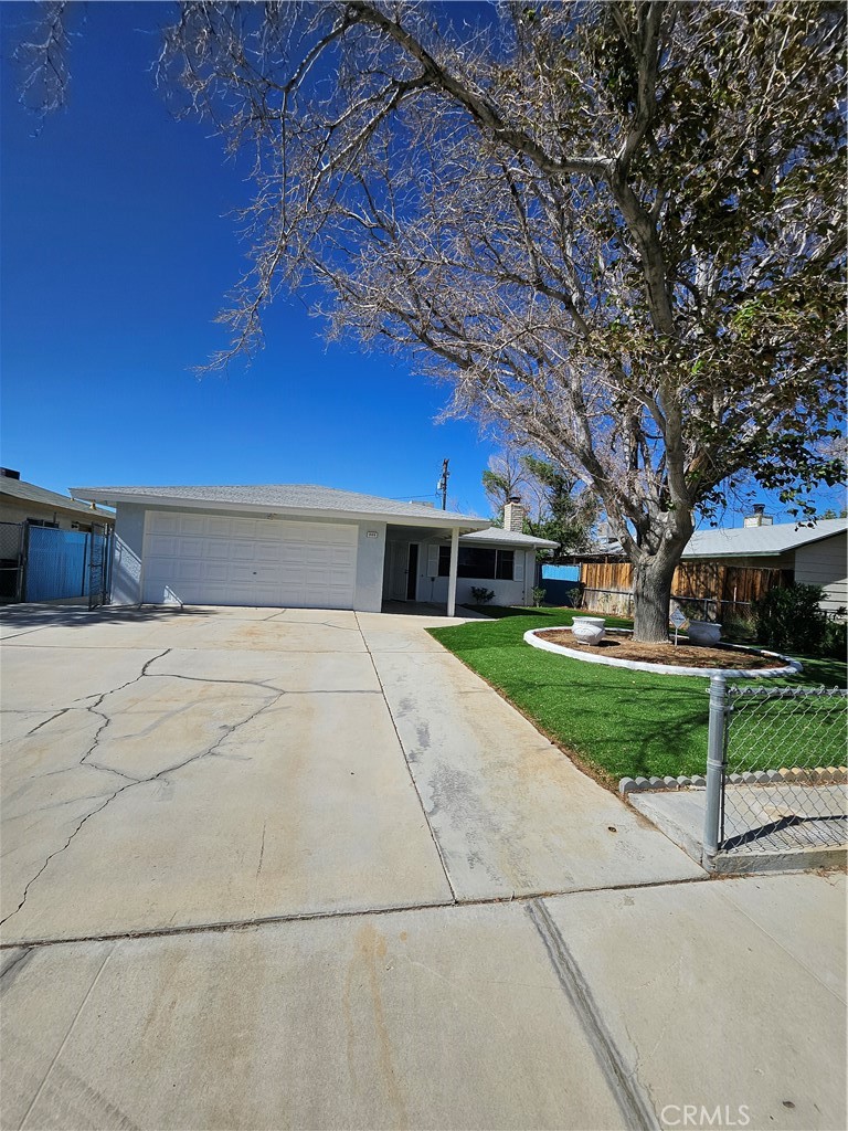 Charming 3 bedroom home with spacious lot. Welcome to this beautifully maintained 3 bedroom, 2 bathroom home offering 1,401 square feet of comfortable living space. Situated on a generous 6,098 square foot lot, this property combines functionality, charm, and outdoor space perfect for relaxing or entertaining. Enter into a bright and inviting interior featuring a well-designed floor plan with abundant natural light. The living room features marble flooring, while the kitchen has quartz countertops, offering plenty of counter space and storage for all your culinary needs. The master bedroom includes a private bathroom, granite countertop and the two additional bedrooms are perfect for the family, all three bedrooms have marble floors. Outside, enjoy a backyard with endless possibilities: garden, play area, or even space for future expansion. With plenty of space and a great layout, this home is ideal for families or anyone looking for comfort and convenience. Don't miss your opportunity to own this move-in ready gem!