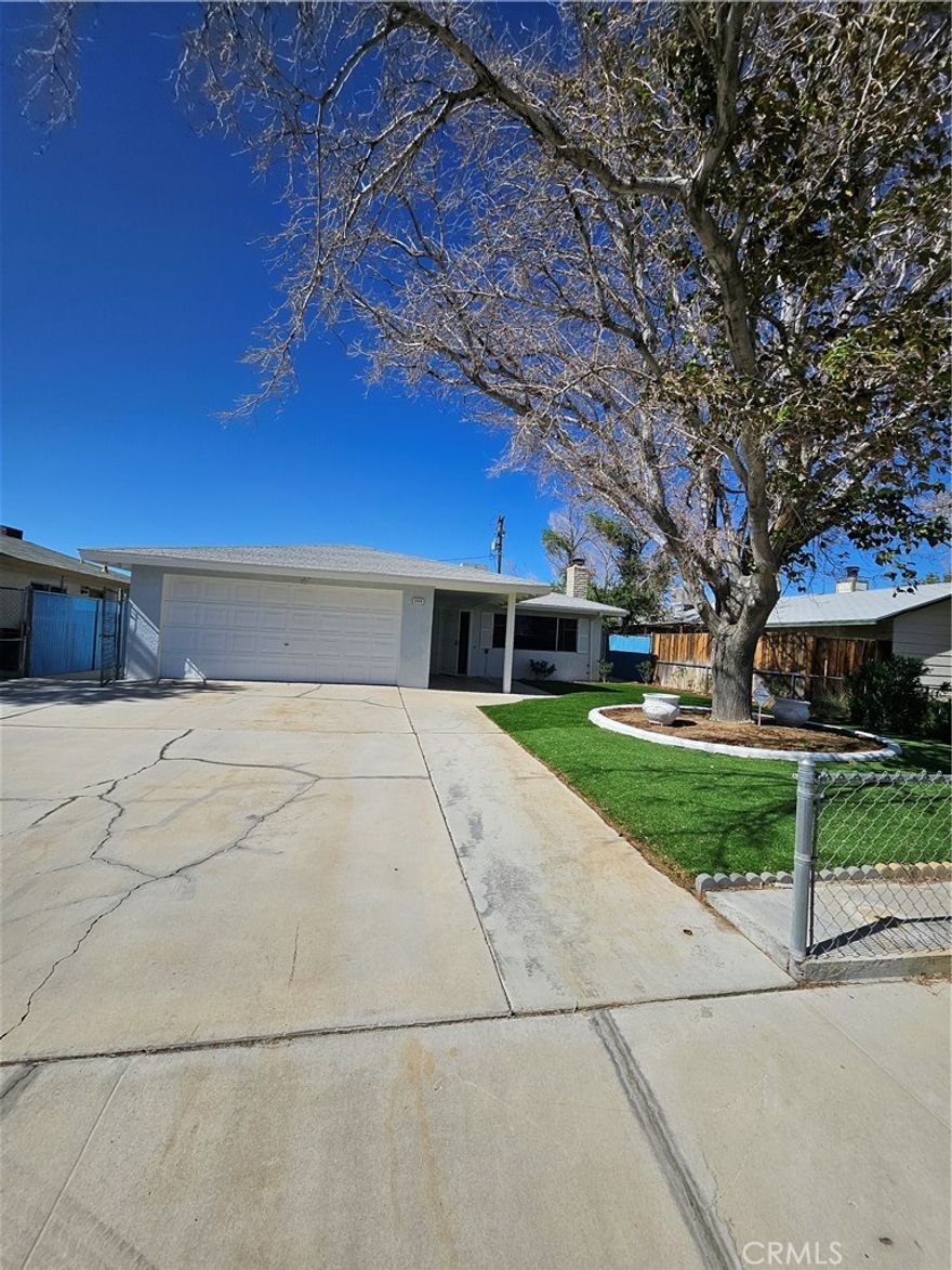 Charming 3 bedroom home with spacious lot. Welcome to this beautifully maintained 3 bedroom, 2 bathroom home offering 1,401 square feet of comfortable living space. Situated on a generous 6,098 square foot lot, this property combines functionality, charm, and outdoor space perfect for relaxing or entertaining. Enter into a bright and inviting interior featuring a well-designed floor plan with abundant natural light. The living room features marble flooring, while the kitchen has quartz countertops, offering plenty of counter space and storage for all your culinary needs. The master bedroom includes a private bathroom, granite countertop and the two additional bedrooms are perfect for the family, all three bedrooms have marble floors. Outside, enjoy a backyard with endless possibilities: garden, play area, or even space for future expansion. With plenty of space and a great layout, this home is ideal for families or anyone looking for comfort and convenience. Don't miss your opportunity to own this move-in ready gem!
