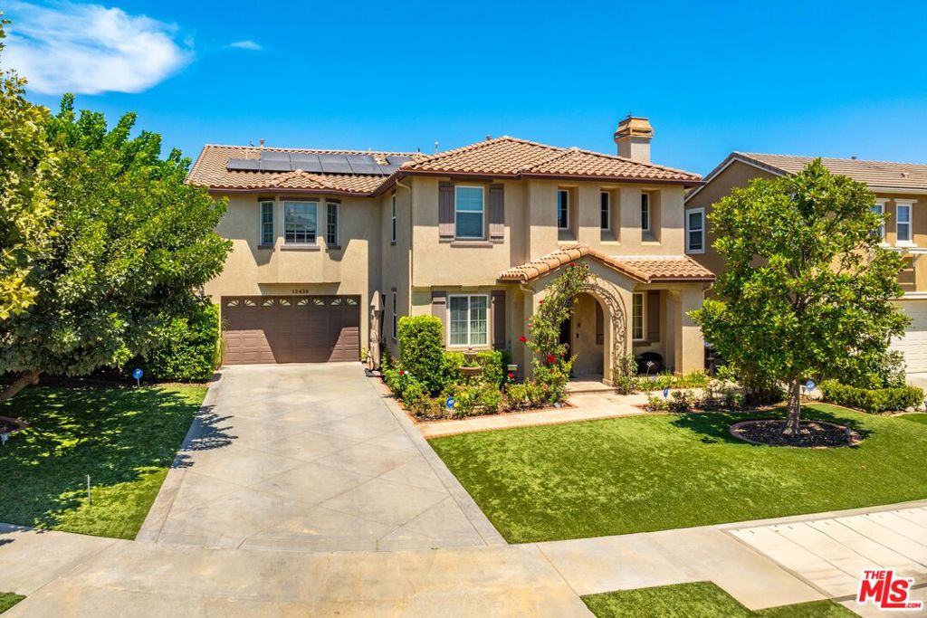 WOW! 4,149 SQ FT WITH CUSTOM POOL, ELEVATOR & SOLAR RARE FIND IN RANCHO CASCADES! This one-of-a-kind Mediterranean-style luxury estate is a true showpiece, meticulously crafted with no expense spared for the most discerning buyer. Blending timeless elegance with modern convenience, this expansive two-story custom home is the epitome of upscale Southern California living. Step inside to soaring ceilings and a grand layout featuring a formal living room with fireplace, a spacious family dining room, and a private libraryideal for remote work or quiet retreat. The gourmet kitchen is a chef's dream, showcasing granite countertops, top-tier built-in appliances, a large center island with breakfast bar, and a walk-in pantry. A second fireplace warms the family room, which flows effortlessly into the stunning formal dining room (added in 2011), opening directly to an entertainer's dream backyard.Upstairs, enjoy the privacy of a separate guest suite, also added in 2011, complete with its own sitting room, en-suite bathroom, and serene terrace with separate entranceaccessible via a private, wheelchair-friendly elevator. The second primary suite offers spa-like luxury with a soaking tub, walk-in shower, and dual vanities. Two additional guest rooms are tastefully appointed, while a cozy loft with custom bench seating adds versatile living space for reading, study, or play.Outside, your private resort-style oasis awaits: a custom heated lap pool and spa (built in 2015) with underwater current for swim-in-place workouts, plus a retractable pool cover for safety and convenience. The covered patio (2007) features a built-in gas fireplace, outdoor BBQ kitchen, hot/cold wet bar, and plenty of room to entertain in style. Low-maintenance drought-tolerant landscaping with artificial turf completes the beautifully manicured yard.Designed for comfort, efficiency, and sustainability, this smart home is packed with premium upgrades: paid-off solar system, full audio and Ethernet wiring throughout, three-zone A/C, EV charger, gas/propane backup generator, and a garage converted into a fully functional officeperfect for today's hybrid work environment.From its rare elevator access and solar energy savings to its entertainer-friendly layout and luxurious finishes, this exceptional property truly has it all. A rare opportunity in one of the Valley's most coveted neighborhoodsRancho Cascades!