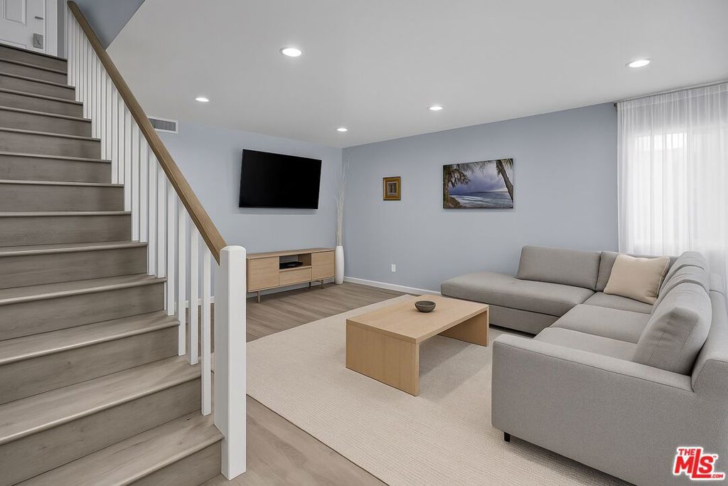 Photo of 18411 Hatteras Street #114, Tarzana, CA 91356 (MLS # 26676857)