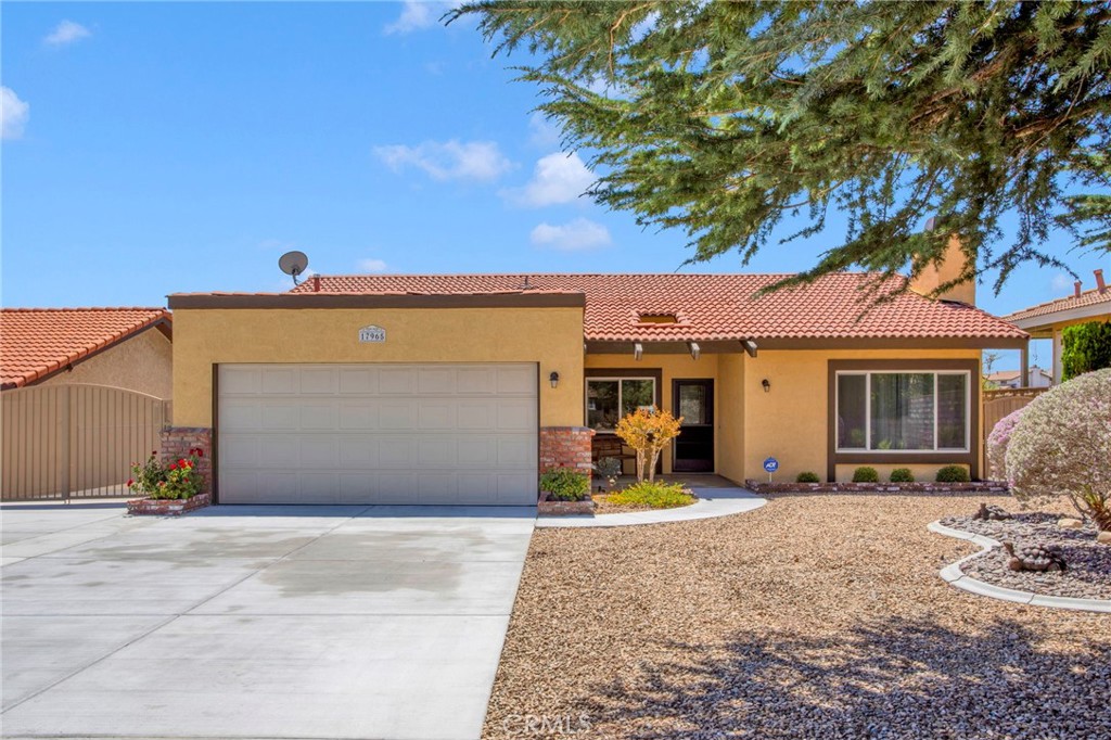 Rare hilltop, cul-de-sac home! Welcome to this gorgeous lake & mountain view home with RV parking in highly desired Spring Valley Lake(SVL). This remodeled 3-bedroom, 2-bathroom home is 1960 sf on a 7200 sf lot, with a perfect blend of style, comfort, and tranquility, for you and your family’s enjoyment. Upon entering, you'll be greeted by a bright airy living space with ample natural light, high valued ceiling and fireplace, creating a warm and inviting ambiance. There is a formal dining room adjacent to the living room, perfect for special occasions. Enjoy the oversized family room, perfect for relaxation and entertainment. The newly remodeled kitchen is the heart of this floor plan, completely open to the family room and covered back patio. It features quartz countertops, new stainless steel appliances, along with a center island having lots of storage space, making meal preparation a breeze. The master suite offers a peaceful sanctuary with a private en-suite bathroom and mirrored closet doors. Master suite includes a sliding door out to the patio, to enjoy the beautiful views, while enjoying your morning cup of coffee. Two additional bedrooms and a second full bathroom. Recent upgrades include drought resistant front yard, remodeled kitchen and bathrooms with all new countertops, and freshly painted interior and exterior. Backyard is perfect for entertaining, new covered patio with ceiling fans for those beautiful summer nights with family and friends, and to enjoy the best view of the annual 4th of July fire work show on the lake! RV parking on the side of the home includes a 30 amp plug. The prestigious Spring Valley Lake community includes the benefits of access to a 200-acre lake perfect for water sports, a beautiful beach for those warm summer days, two family parks, dog park, and 14 fishing areas. The Community Center, offering gathering and monthly activities, is a place to meet neighbors and partake in holiday festivities. There's also a 24-hour security patrol for peace of mind. Families seeking to elevate their lifestyle may join the Spring Valley Country Club within SVL, which offers an array of amenities: tennis and racquetball courts, a fitness center, and 18-hole golf course. The Country club also offers an Olympic-sized pool, Jacuzzi, and a restaurant with sports pub having music regularly on their patio.This house is a must-see and will not last!! ** Some photos are virtually staged to show endless possibilities!!!