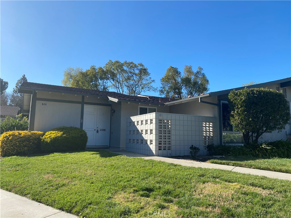 Location, Location, Location popular Valencia floor plan in a great location near Aliso Creek. End unit 2 bedrooms, one bathroom, No one above or below, nestled in the prestigious neighborhood of Laguna Woods Village. The vaulted ceiling, nice & clean carpet in the living room really opens this home up, 2 bedrooms have carpet also. The Kitchen and dining area has laminated flooring. The kitchen has all appliances Oven, Dish Washer, Refrigerator and Stove. The extra-large bathroom has 2 vanity and features a solar tube for natural light. For your comfort the home has dual pane windows, a ceiling fan in the living room and a heat pump also. You will really appreciate all the natural light provided by the inner atrium. The front patio is a great place to enjoy the day. Laguna Woods Village is a gated 55+ adult community , ideally located just short drive 7 miles to Laguna Beach, amenities include ,27 hole championship Golf Course , tennis , 5 pools & Spas , fitness centers , equestrian center , wood shop , 7 Clubhouses, 250 Social Clubs , FREE Bus Transportation is provided within the community and local shopping ,bank ,restaurant, medical facilities and world class shopping mall! Make this lovely home yours and start enjoying the amenities of the village, WHERE NEW ADVENTURE BEGIN!