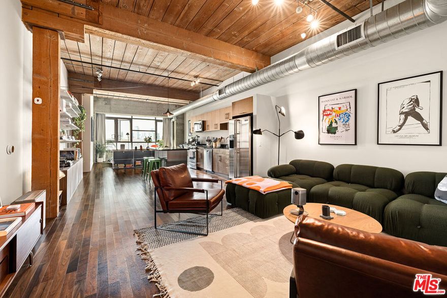 Welcome to the "King of Arts District", DTLA's full service and highly sought after Barker Block! Check out this west-facing, nearly 1,000sf open NY style urban loft featuring spectacular Downtown Skyline views, not to mention some of the most impressive sunsets imaginable all revealed via a floor-to-ceiling west wall of windows! Beautiful two-tone hardwood floors throughout. The high ceilings are stunning boasting turn-of- century timbers from the original Barker Brothers Building.  Fully functional chefs kitchen showcasing a stainless steel appliance package, in unit washer/dryer and and large bathroom with soaking tub. One of the most secure buildings in downtown supported by 24hr security, both patrol and camera surveillance. The resort style amenity package offers a rooftop entertainment deck that rivals none! Pool, spa, BBQ, fitness center and simply the best views of the DTLA skyline EVER! Enjoy the mega popular Urth Cafe as well as the Arts District dog park right outside the lobby's front door. Keep the car parked in it's assigned parking space and conveniently access everything the Arts District has to offer from the new Little Tokyo/Arts District Metro station, to the renowned Hauser & Wirth Art Galley to hip brewery's & restaurants like Angel City, Bike Shed Motor Co, Bavel, Girl & The Goat, Baroo, Bestia, Damian, Camphor, Manuela, Camelia and so many more, it's all right here!