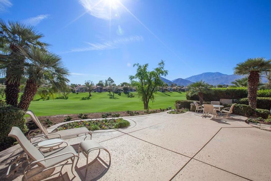 Set atop a knoll with elevated south panoramic views of the 3rd fairway of the renowned Robert Trent Jones Jr. Course and expansive Santa Rosa mountains. This charming Terraza 2 plan offers an  open floor plan concept design with natural light, soaring ceilings and elevated windows galore. Living room and family room boasts a three sided fireplace.  Featuring approx. 2,680 SF, 3 bedrooms, 3.5 baths. Includes a 2 room guest house with two separate entrances-second room presently used as an office could be converted into a 4th bedroom & is separated by a large bathroom. Primary bedroom suite overlooks the golf course & French door leads to a private patio offering dramatic southeast views. Room for a pool or spa. Community pool/spa is across the street-just a short walk.  Interior features include a granite slab counters kitchen. Additional upgrades include Solar panels with low electricity bills & newer AC & water heater in main house.  Property would make a great 1031 exchange/ investment/income property or for those in search of an affordable Rancho La Quinta CC  property.  HOA dues of $1,198 per month include a social membership with club house access/dining facilities, fitness center, 9 tennis courts, 8 pickleball courts, bocce courts, front landscaping, trash, direct TV & high speed internet. Private membership to 36 holes of membership is a separate membership. Experience exciting lifestyle amenities in this premier country club.