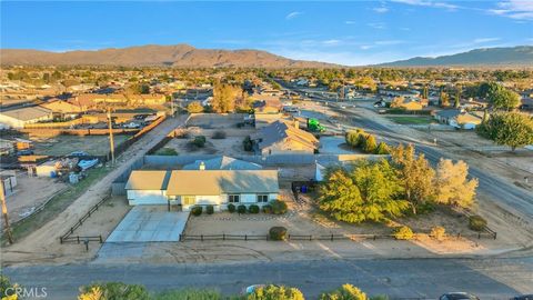 Photo of 12887 Sholic Rd, Apple Valley, CA 92308 (MLS # HD25268235)
