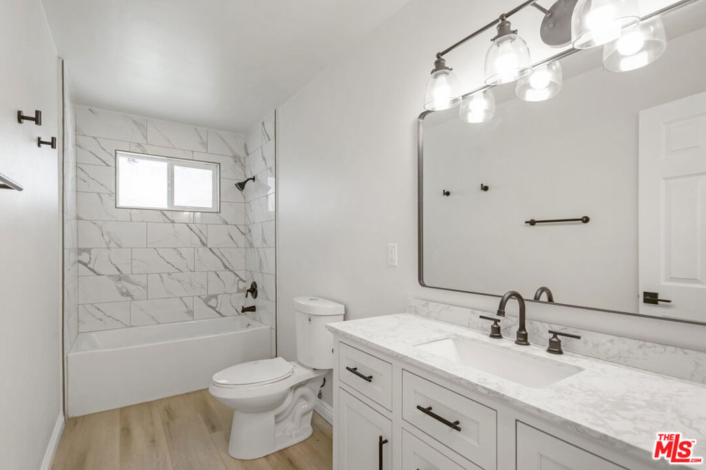 Experience the perfect blend of style, space, and convenience in this beautifully renovated single-family home. Featuring three generously sized bedrooms and two full bathrooms, this residence is thoughtfully updated to meet today's lifestyle needs. Inside, enjoy brand-new appliances, updated flooring, and fresh interior paint throughout. For added comfort and efficiency, brand-new mini-splits will be installed prior to the close of escrow. Whether you're a growing family, a professional seeking space to work from home, or simply someone who appreciates a quiet, established neighborhood, this move-in ready home offers a peaceful retreat designed for everyday living and effortless entertaining.