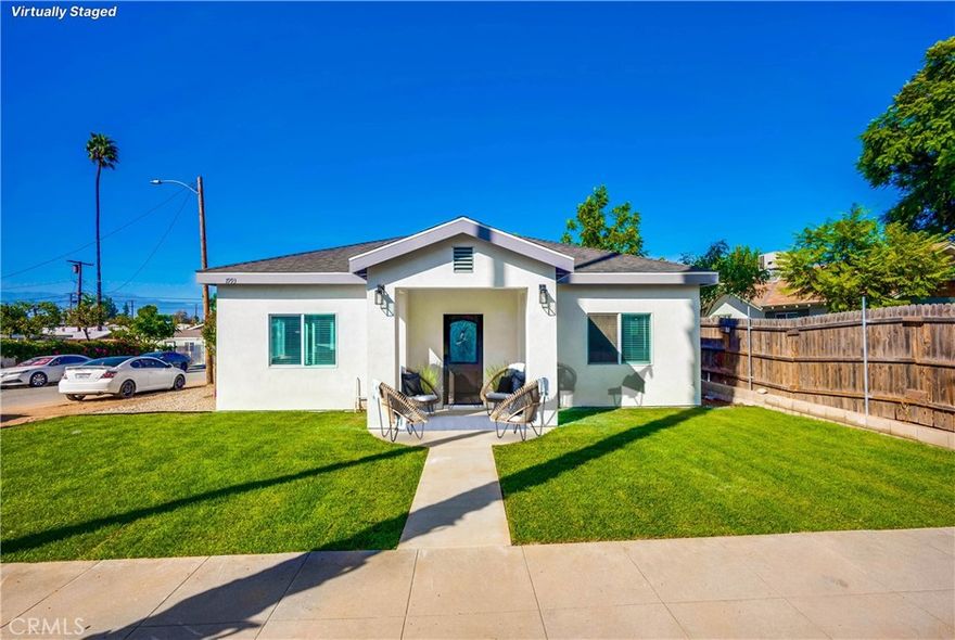 Three homes.  One property.  Endless possibilities!  This property offers 3 units on one lot - perfect for long-term investment.  The first home is 1550sf with 4 bedrooms, 2 bathrooms, and an attached 2-car garage - the perfect single-level home!  The second unit is a 950sf 3 bedroom/2 bathroom, and the third is a junior ADU with one bed and bath.  This property is newly built with all of the finest finishes and modern updates, including open concept living areas, paid solar panels, a beautifully landscaped lawn and yard, dual-paned windows, updated appliances, and energy-efficient HVAC.  The kitchens and baths consist of crisp white cabinetry and the floors are sturdy laminate, showcasing the quality of work put into this newly-completed compound.  The corner lot affords plenty of parking.   Live in one and rent the others, or lease out the whole property - this is a great investment or buy-and-hold opportunity.