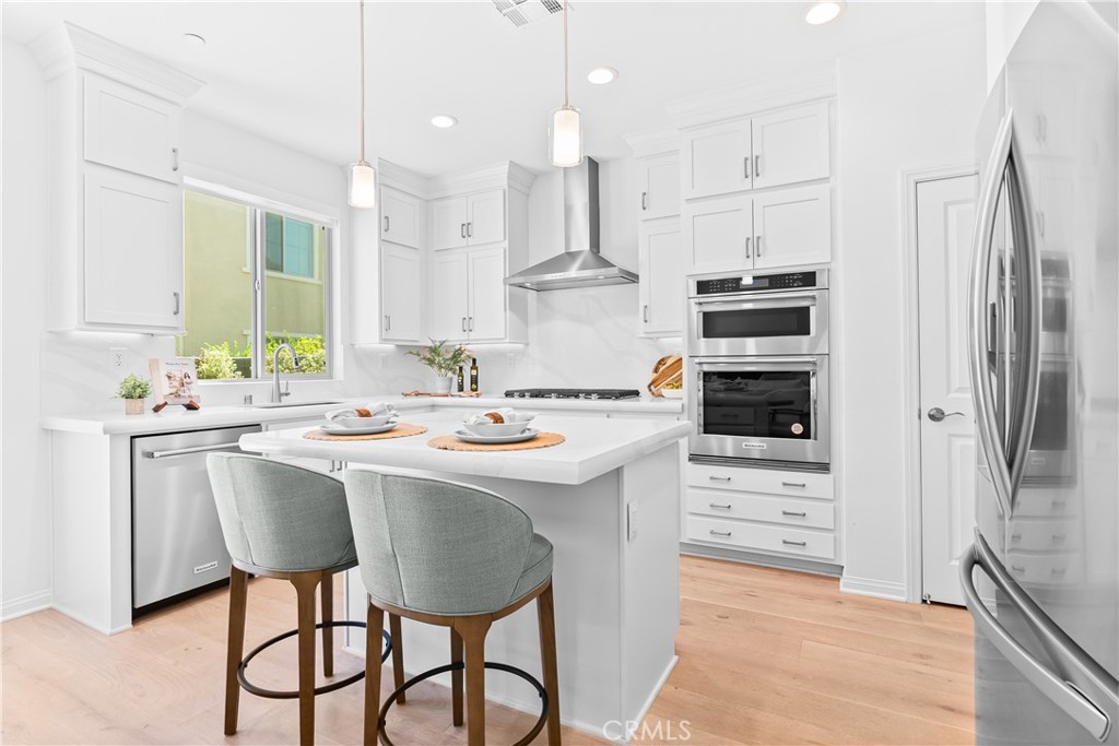 Welcome to your new home in the highly sought-after Evolve neighborhood within the award-winning community of Rancho Mission Viejo! Just steps from Boulder Pond, the neighborhood park and playground, and the Ranch Cove, this home also sits near the planned Rienda K–8 School set to open in 2027, placing convenience and community right at your doorstep. Inside, modern finishes and stylish upgrades set the tone from the moment you walk in. The spacious, open floor plan seamlessly connects the kitchen, dining, and living areas, creating a natural flow that makes both entertaining and everyday living effortless. Whether hosting friends or enjoying quiet evenings with loved ones, this home is designed to fit your lifestyle beautifully. The kitchen boasts stainless steel appliances, quartz countertops, and ample cabinet space, making it a chef's dream. Upstairs, you will find a cozy loft that can serve as a secondary living area or an office space, providing flexibility and versatility to fit your needs. There’s plenty of natural light, providing a warm and inviting atmosphere. The primary bedroom features an en-suite bath with a dual vanity sink, a large walk-in shower, and a spacious walk-in closet. Step outside to your private backyard, where you can relax and unwind while enjoying the fresh air and space. With all these features and more, this home is the perfect place to call your own. Other features include: $90,000 in upgrades with purchase and $70,000 in upgrades after purchase, leased SOLAR with battery, kitchen cabinets that go to the ceiling, upgraded backsplash, and so much more! Immerse yourself in the exceptional amenities of Rancho Mission Viejo, including the vibrant Ranch Camp, the state-of-the-art Ranch Cove community pool and gym, and countless recreational opportunities that define the unmatched lifestyle of this community. Exclusive to Rancho Mission Viejo residents are all amenities in the Villages of Sendero, Esencia, Rienda and future Villages. There are community amenities for all from breath-taking resort-style pools and spas, Esencia school K-8, community farms, fitness centers, guest house, putting green, bocce ball courts, tennis and pickle ball courts, playgrounds, coffee shop, fire pits, an arcade and so much more!