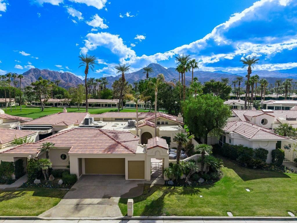 Leased Jan./Feb. 2026.~ Stunning Furnished Home with Spectacular South Mountain and Fairway Views! Enjoy breathtaking sunsets and serene mountain vistas from this gorgeous 3-bedroom, 4-bath home. Welcoming you is a beautiful private courtyard with sitting area. A spacious open living concept; a gorgeous appointed interior, ideal for entertaining friends and family. Architectural Highlights; Entry foyer, high ceilings, elegant vinyl plank flooring and remote-controlled blinds throughout the home. The Living Room features a large TV and a wet bar complete with a wine refrigerator. Gourmet Kitchen is equipped with an oversized island, quartz countertops and top-of-the-line Bosch stainless steel appliances including double ovens. Enjoy meals in the cozy Breakfast Nook or at the Dining table for 8 or relax in the Den by the cozy Fireplace. Luxurious Master Suite with a King bed, private patio access, large shower, spa bath, and a spacious walk-in closet. Guest Rooms: 2 additional Guest Rooms feature Queen-size beds and updated en-suite Baths. Step out to the expansive outdoor Patio featuring dining for 6, perfect for enjoying the picturesque Views of the 18th fairway and surrounding Mountains. Just steps away from the community pool. Don't miss out on this extraordinary opportunity to lease a home that combines elegance, convenience, and stunning natural beauty. Minutes to El Paseo for Shopping and Dining. For Month of March only $12,000.