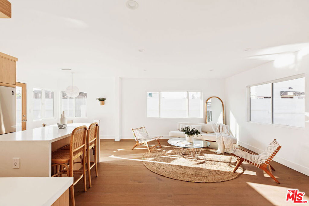 Welcome to this stunning, fully renovated duplex in the heart of Culver City Arts District! This rare opportunity to own two 3-bedroom units, with designer finishes over an open concept layout on one lot. Each unit features 3 bedrooms, 2 bathrooms, offering a seamless blend of size, modern convenience, and charm. Upon entering, you'll be greeted by an open layout that seamlessly connects the living, dining, and kitchen areas. The kitchens are adorned with newer appliances, sleek countertops, and ample cabinet space, catering to all culinary needs. This property has undergone a total renovation, upgraded electrical panel, boasting updated flooring, tankless water heaters, stylish kitchen, bathrooms, and modern fixtures throughout. Conveniently located near a plethora of amenities including: new Apple corporate office, Sony Pictures Studio, Whole Foods, Trader Joes, Target, Culver City Steps, numerous entertainment, and award winning dining options. This duplex presents an exceptional opportunity for both homeowners and investors alike. Don't miss the chance to own this rare beautifully renovated duplex in a prime LA location with big upside potential.