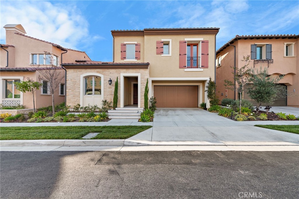 Located in the prestigious gated community of The Groves at Orchard Hills, this beautifully crafted Palermo Plan 2 residence by Taylor Morrison offers an exceptional blend of luxury, comfort, and modern elegance. Featuring 4 bedrooms, 4.5 bathrooms, and a two-car garage, this home showcases impeccable design and thoughtful functionality.
Upon entering, you are greeted by luxury waterproof vinyl plank flooring throughout the open-concept layout. Dramatic high ceilings and expansive windows fill the home with abundant natural light, creating a warm and inviting atmosphere.
The main floor includes a spacious guest suite with a private bathroom, along with a versatile office space that can easily be converted into a fifth bedroom to suit your needs.
The open-concept great room seamlessly connects to the gourmet kitchen and dining area, forming the heart of the home. The kitchen is a chef’s dream, appointed with elegant quartz countertops, an oversized island with an extended bar seating, high-end stainless steel appliances, and custom white cabinetry—perfect for both daily living and entertaining.
Upstairs, the loft area offers a cozy retreat for family movie nights or casual gatherings, enhanced by built-in lighting and wide windows.
The luxurious primary suite is a true private sanctuary, featuring dual vanities, a large walk-in shower, a soaking tub, and a spacious walk-in closet with custom built-ins. Two additional ensuite bedrooms are thoughtfully positioned on the opposite side of the loft, providing privacy and quiet for all family members.
This home also comes equipped with a fully owned solar system, promoting energy efficiency and long-term savings while supporting a sustainable lifestyle.
Step outside to the beautifully designed California Room, offering a covered outdoor living space perfect for relaxing or entertaining. Surrounded by picturesque hillsides and lush avocado groves, the backyard creates a peaceful, scenic retreat.
Residents of Orchard Hills enjoy access to an array of resort-style amenities, including multiple pools, clubhouses, parks, hiking trails, basketball courts, and tennis courts.
The community is also conveniently close to award-winning schools and the vibrant Orchard Hills Shopping Center, providing both daily convenience and luxury living.
Don’t miss this rare opportunity to experience the best of Irvine’s most sought-after community, where everyday living feels like a vacation!