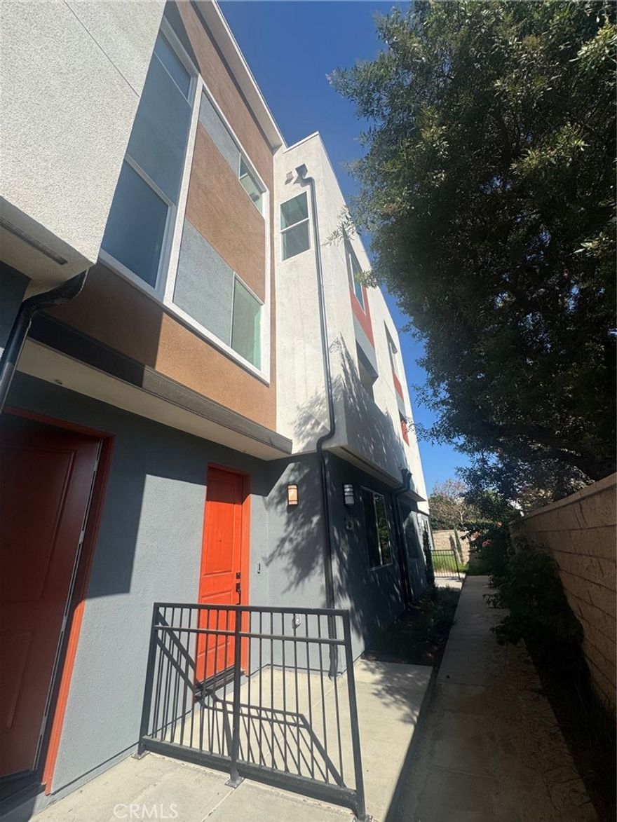 Experience elevated living in this spacious, modern townhome offering more square footage and thoughtful design throughout—including an optional 4th bedroom and full bath on the entry level, ideal for guests or a home office.



MORE SQUARE FOOTAGE - MORE BEDROOMS - MORE BATHROOMS -BEST BUY NEW IN OC!



The second level boasts high ceilings , expansive windows that flood the space with natural light, and a stylish open-concept layout. The gourmet kitchen is a chef’s dream with upgraded designer backsplash, quartz countertops, and an oversized center island perfect for entertaining and cabinetry storage. A dedicated study nook and seamless access to the covered 2nd-floor patio offer both functionality and fresh-air relaxation.



The primary suite features oversized windows, a large walk-in closet, and a spa-inspired ensuite bath with dual sinks and quartz counters. Two additional upstairs bedrooms share a full bathroom, with convenient upstairs laundry and ceiling fan pre-wiring in all bedrooms for comfort and efficiency.



Top it all off with a private rooftop deck—included with every plan—where you can soak up the California sunshine and enjoy even more outdoor living space.







Upgrades include:



Upgraded vinyl flooring



Upgraded carpet



Designer kitchen backsplash



Custom window coverings



Spa-inspired primary suite with dual sinks and large walk-in closet



Private rooftop deck to enjoy fresh breezes



EV-ready 2-car side-by-side garage



Private showings available by appointment.