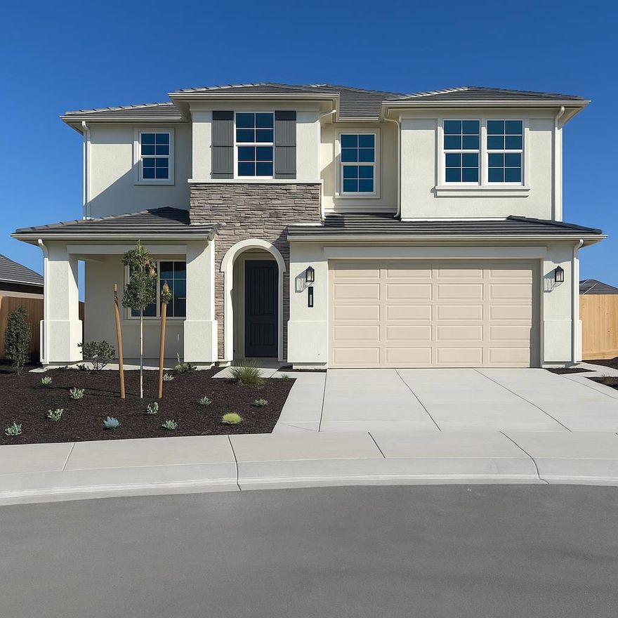 Beautiful Two-Story Home with Designer Upgrades! This stunning two-story home features a spacious great room, a downstairs bedroom with full bath, and ample storage throughout. The gourmet kitchen is a dream, showcasing white quartz countertops, an upgraded gloss backsplash, custom stained shaker cabinetry in the color Vintage, stainless steel appliances, and a large pantry. A custom wood stair rail leads to a versatile loft, perfect for a game room, office, or media space. Upstairs, the spacious guest bedrooms offer remarkable views of the countryside or community below, while bathrooms feature engineered marble vanities and surrounds for timeless style. Enjoy sweeping views from the upstairs primary suite, complete with a private retreat, oversized walk-in closet with built-in organizers, and a spa-inspired bathroom with dual vanities, separate shower, and a luxurious Kohler soaking tub.  Additional features include textured & painted 2-car garage, drought-tolerant landscaping, Ecobee Smart Thermostat & Ring doorbell, and more! This home blends luxury, comfort, and convenience!