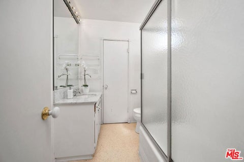 Tiny photo for 979 Casiano Road, Los Angeles, CA 90049 (MLS # 26942693)