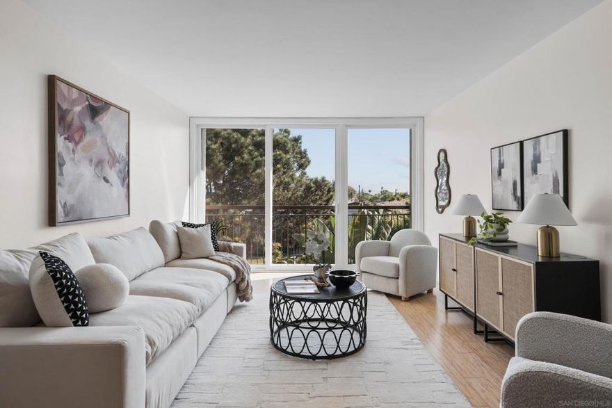 Bay views from your living room, dining, and kitchen of this top-floor residence at The Regency in Pacific Beach. Perfectly positioned just blocks from the water, this home captures the essence of San Diego’s coastal lifestyle, relaxed, and connected to everything that makes this neighborhood so desirable. Inside, the open floor plan is airy and light-filled,  living room slider and expansive windows that frame the bay and create an immediate sense of space. The main living areas flow seamlessly together, making it ideal for both everyday living and entertaining. The kitchen is positioned to take full advantage of the view, allowing you to enjoy the beauty of the bay from the heart of the home. The bedroom offers a quiet retreat surrounded by lush greenery, creating a tranquil setting to start and end each day. Two spacious bedroom closets provide ample storage, and the full bathroom is designed with dual access, an ensuite entry from the primary bedroom, and a second entry to accommodate guests comfortably. Practical features add to the appeal: an assigned parking space, in-building laundry, and the privacy of being on the top floor with no neighbors above. Just outside your front door, the pool view sets the tone for a resort-style atmosphere, complemented by a well-maintained community. Amenities include the pool, BBQ area, and dedicated bike and surfboard storage.  The Regency is a fully gated community known for its lush landscaping and coastal charm. Its location offers the best of both worlds: close proximity to the bay, waterfront paths, the ocean, and some of Pacific Beach’s best dining and cafes, while remaining tucked slightly away from the busiest corridors. The result is easy access and a peaceful, residential feel. Pacific Beach, or “PB,” as locals affectionately call it, is one of San Diego’s most sought-after coastal neighborhoods, offering the perfect blend of classic California charm and vibrant local energy. Just minutes from both the bay and the ocean, residents enjoy an active outdoor lifestyle with morning walks on the boardwalk, bike rides along the coast, paddleboarding on the bay, or sunset runs by the water. The neighborhood is centrally located with easy access to major freeways and nearby areas like La Jolla, Mission Bay, and downtown San Diego, making it as convenient as it is beautiful. PB is known for its lively dining and social scene, featuring trendy coffee shops, casual cafés, and popular waterfront restaurants, all balanced by a welcoming neighborhood feel. Depending on where you are, you can experience the energy near Garnet Avenue or the quieter, more residential streets just a few blocks away, where tree-lined roads, walkable paths, and easier parking create a calm, community-oriented vibe. Locals love the easy access to beaches, parks, and bike trails, along with farmers markets, fitness studios, surf shops, and everything needed for a true coastal lifestyle. This residence offers more than just a place to live, it’s a lifestyle defined by light, views, and the unmatched energy of Pacific Beach.