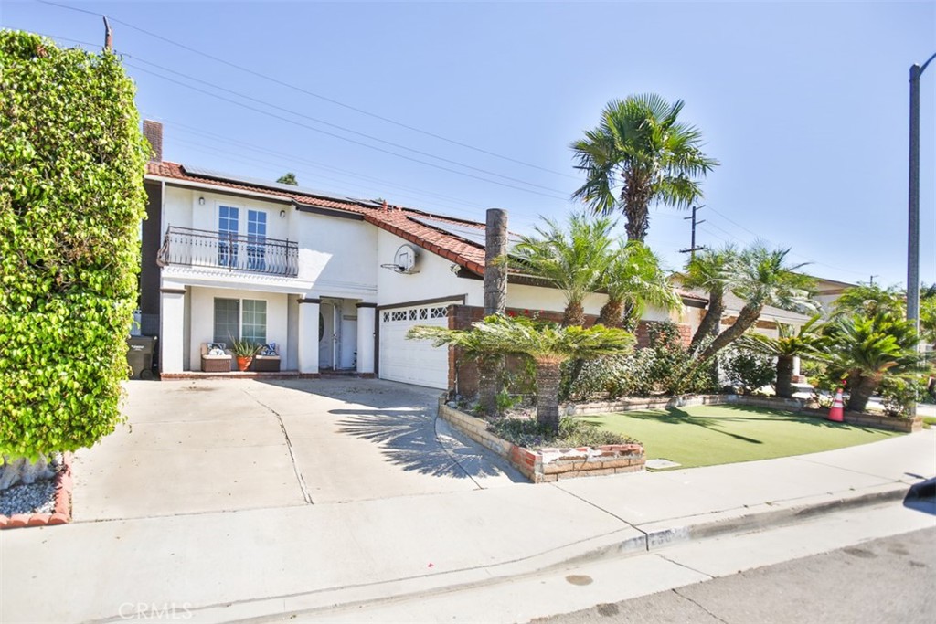 Welcome to 17230 San Lorenzo Circle, set within the coveted Green Valley neighborhood of Fountain Valley. This fully renovated home offers 4 bedrooms, 3 bathrooms, and a versatile bonus room across approximately 2,288 square feet on a 5,400 sq ft lot.
Designed with modern living in mind, the open-concept layout is filled with natural light and enhanced by custom recessed lighting. The chef’s kitchen impresses with a dramatic waterfall island and seamlessly integrated appliances, while the living room is an entertainer’s dream—showcasing a built-in wall aquarium and a striking illuminated wine cellar.
Upstairs, you’ll find all bedrooms, including a luxurious primary suite featuring a private balcony, expansive walk-in closets, and a spa-inspired bath. Indoor-outdoor living is redefined with an enclosed glass patio that opens to a tropical retreat complete with a koi pond and mature longan trees.
Additional highlights include solar panels, a low $45/month HOA with access to pools and clubhouse, and a prime location within walking distance of Mile Square Park and top-rated schools. Blending luxury, comfort, and community, this Fountain Valley gem is truly one-of-a-kind.