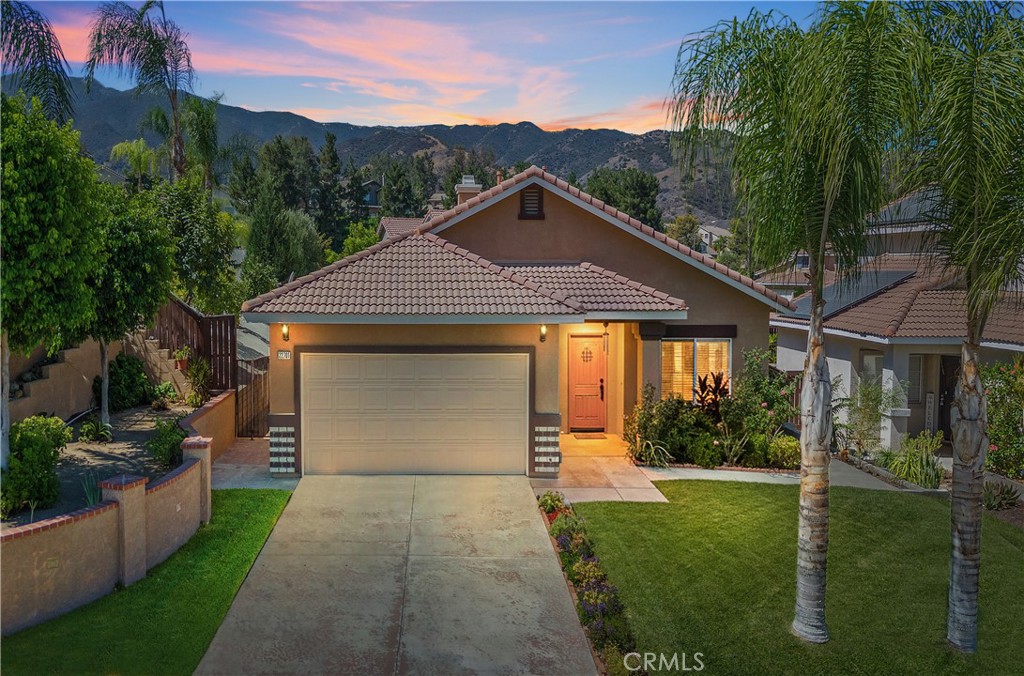 Welcome home to your highly sought after Wildrose Ranch single-story home! Nestled in a tranquil cul-de-sac, this luxurious home features an open floorplan with 3 bedrooms, 2 full bathrooms, 2 living areas, a dining area, and an enclosed patio/bonus room off of the kitchen. The low maintenance backyard features custom concrete and an avocado, orange, lemon and guava tree. This home is a true masterpiece, blending modern conveniences with timeless elegance. Located within walking distance to top rated, Temescal Valley Elementary School, it is close to plenty of nearby shopping, dining, entertainment, golf, and convenient freeway access. You will love this spacious and beautiful home.
