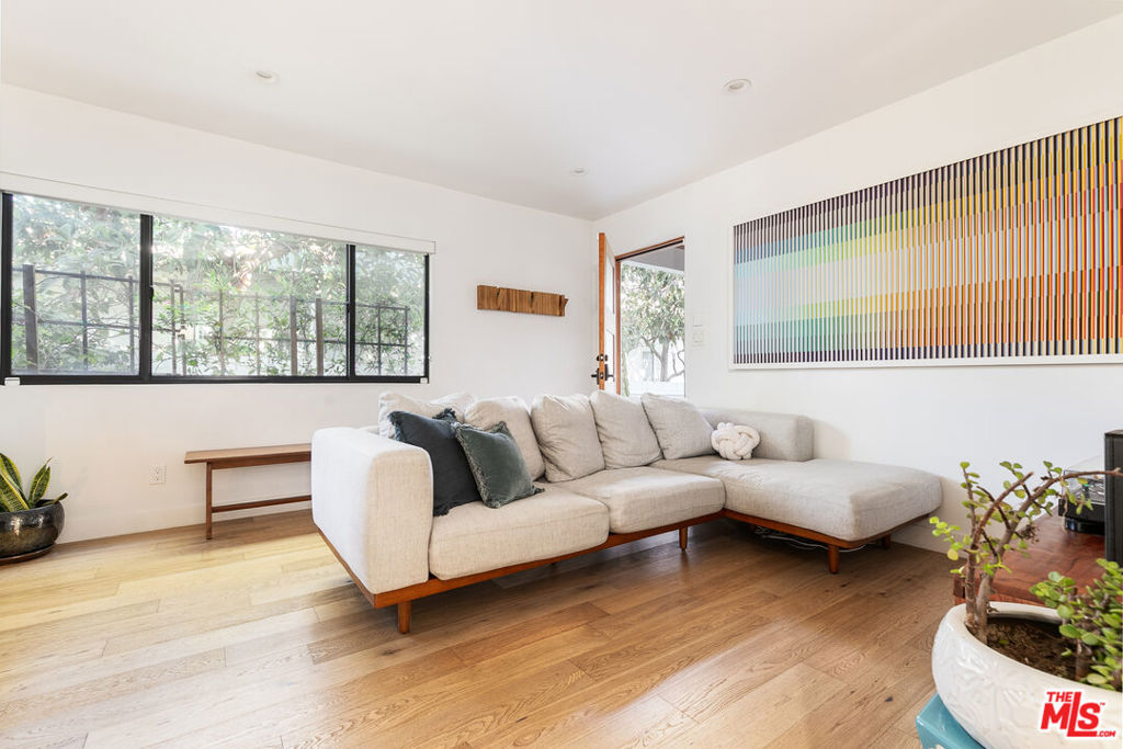 Unmatched Venice Beach location! Just four blocks from the beach, two blocks from Main Street and moments from Abbott Kinney, this turn-key 2-bedroom, 1-bath home is set within a private and gated 4-unit community. Fully remodeled, the open-concept floor plan features newer windows, flooring, and appliances throughout, along with a spacious kitchen complete with a large island and abundant cabinetry for storage. Modern conveniences include in-unit washer and dryer, central A/C, and designated, covered parking. Enjoy beautifully landscaped shared outdoor space with bistro lights centered around an avocado tree plus your own private storage area. You're right around the corner from local favorites like Gjusta, Felix, The Butcher's Daughter, and Salt & Straw, with countless more dining and shopping options nearby. Ditch your car and embrace the beach life at 331 Brooks Ave!